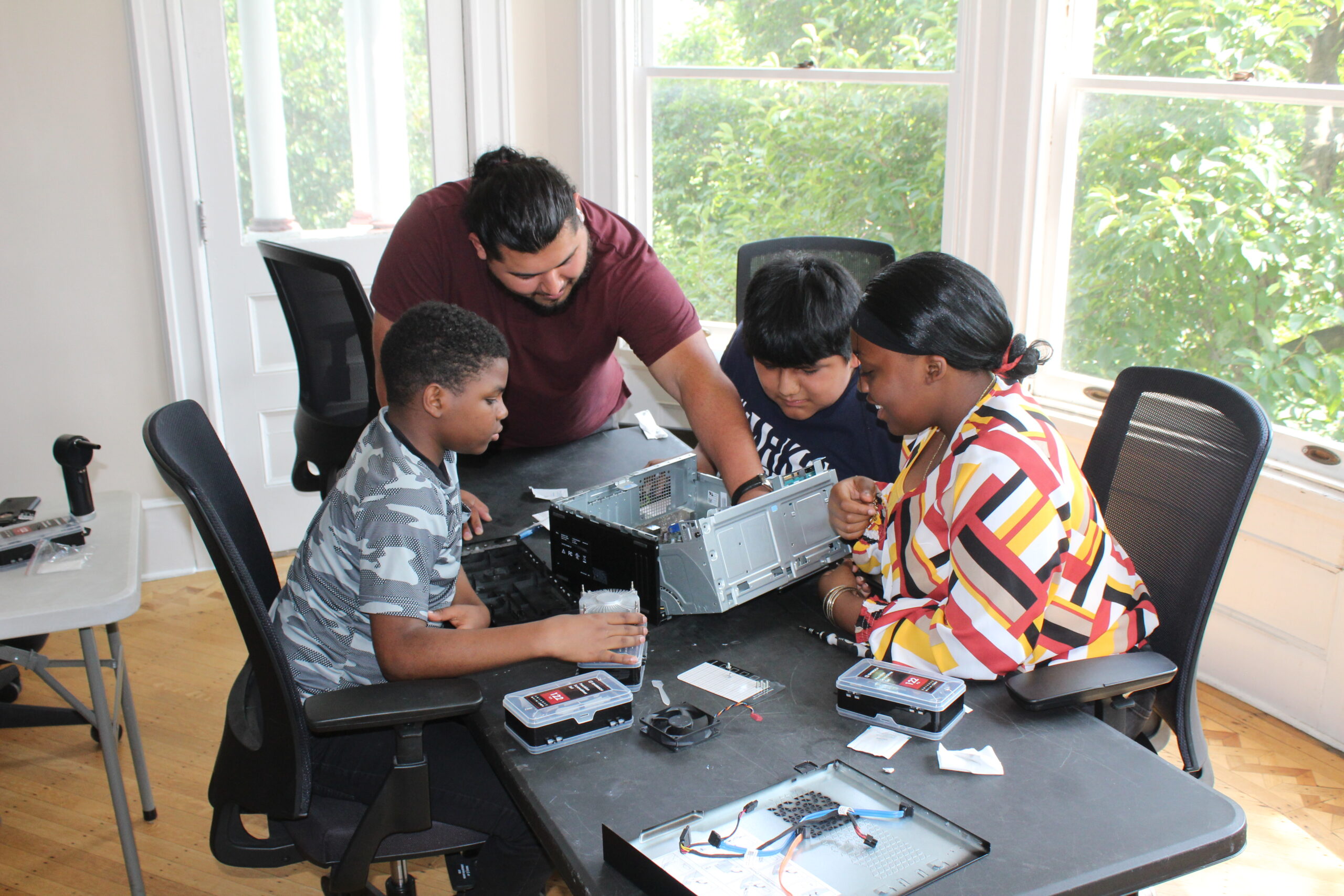 Students learning how to build a PC