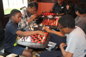 Students practicing chess
